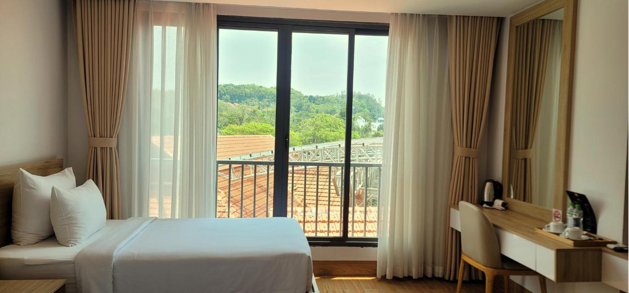 Rosetta Hotel Дуонг-Донг Экстерьер фото
